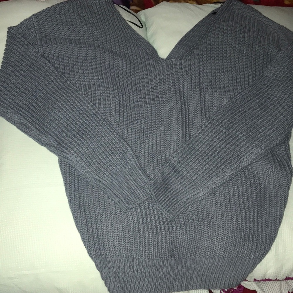 Small gray sweatshirt back opened
